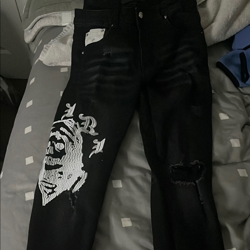 AMIRI Black Skinny Jeans with Distressed Details